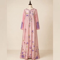  Kaftan style gown with heavy embroidery and satin-silk look fabric.